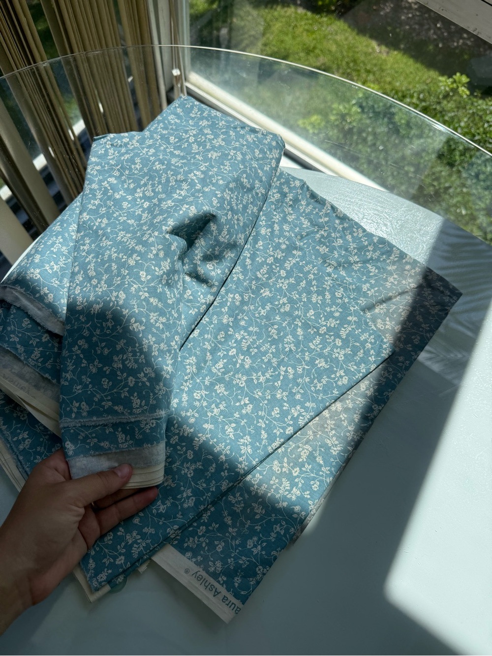 Laura Ashley Blue and White Patterned Fabric